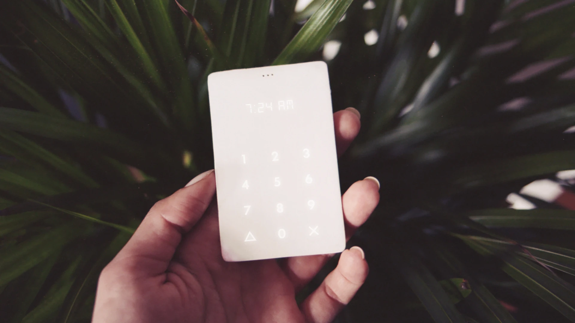 The product is essentially a GSM cell phone with 500 pre-paid minutes that links to the user's smartphone to provide call forwarding