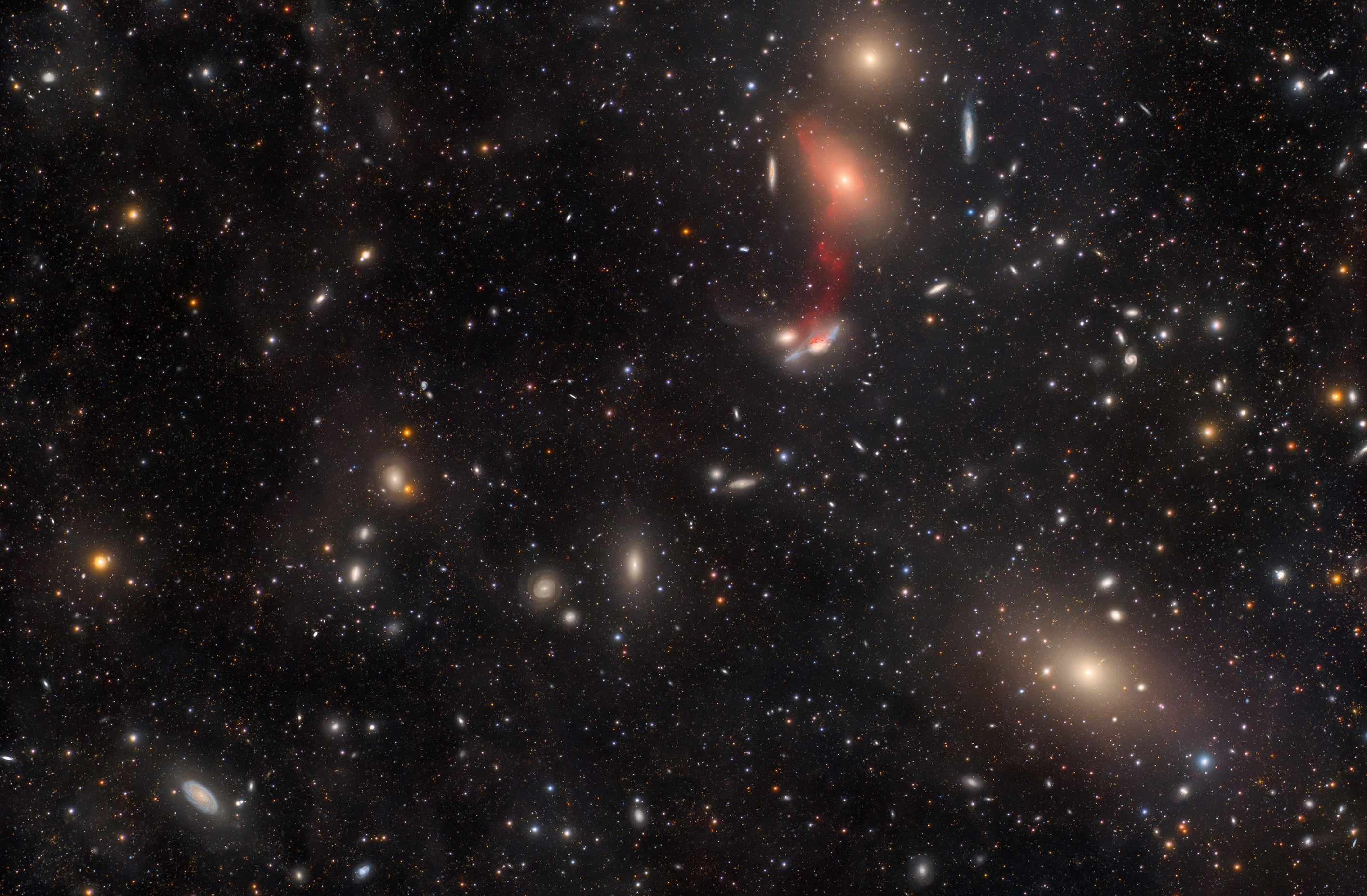 Galaxies Runner-Up: A Very Deep Look at the Markarian’s Chain © Jakob Sahner (Germany). A chain of nearby galaxies in the Virgo cluster