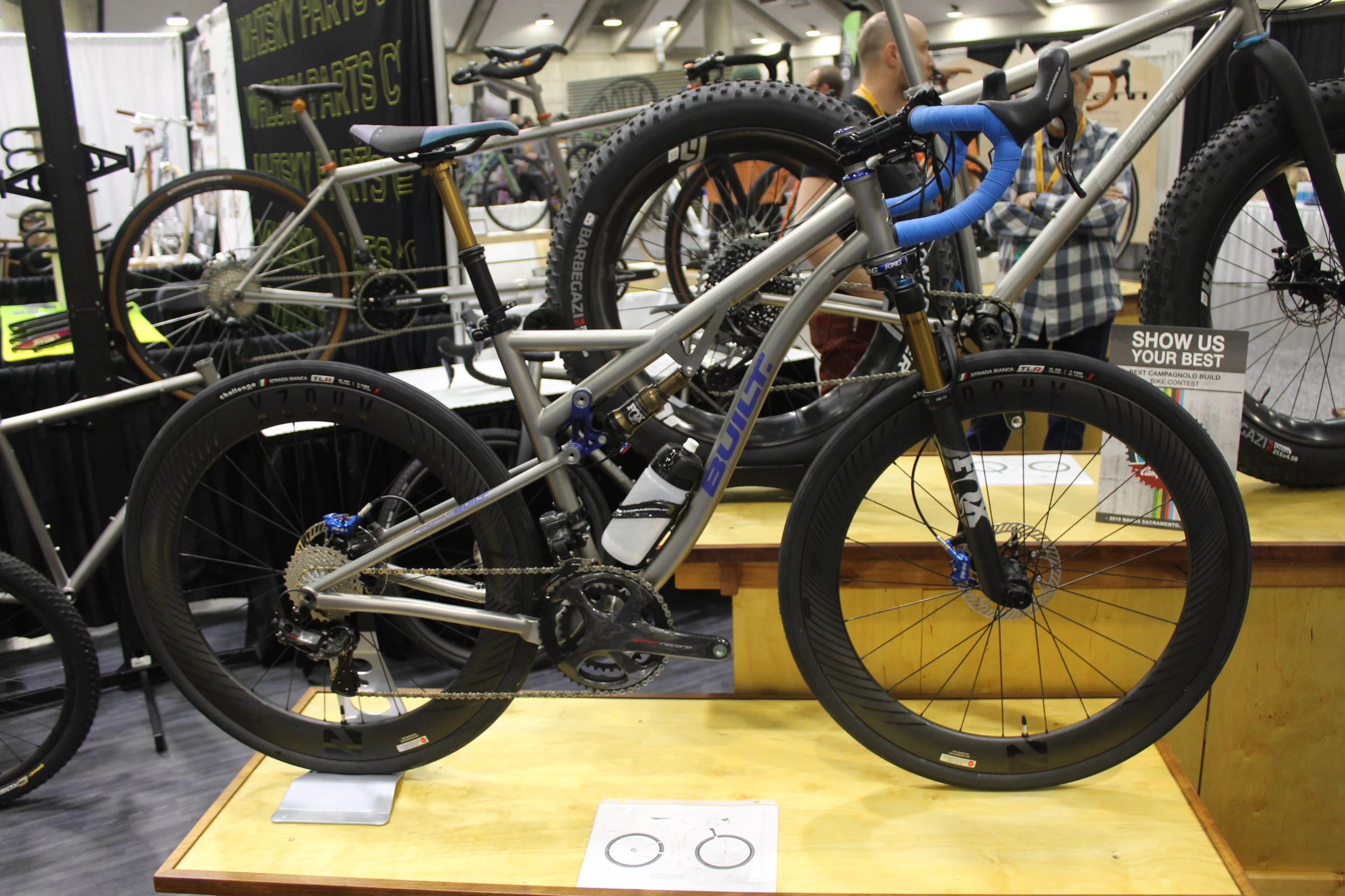 Made by the company Built, for a client with leg and back issues, this titanium road bike has a dropper seatpost for easier mounting/dismounting, along with front and rear shocks for absorbing road bumps