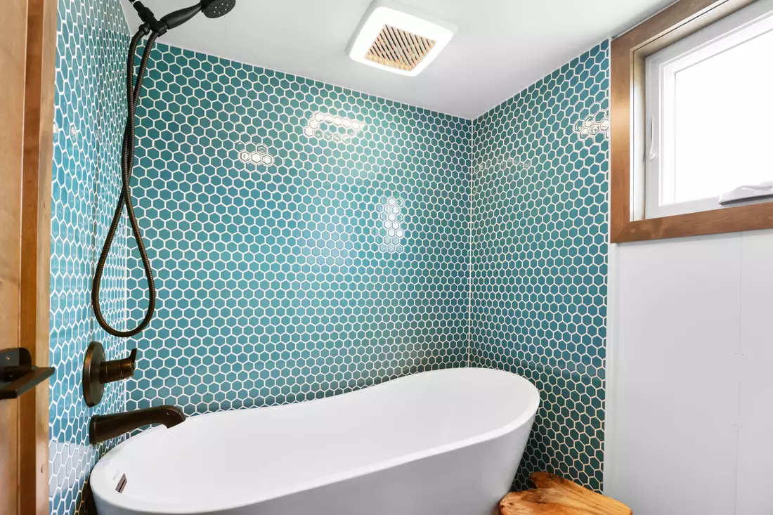 Mi Casita's bathroom makes space for a freestanding tub and shower