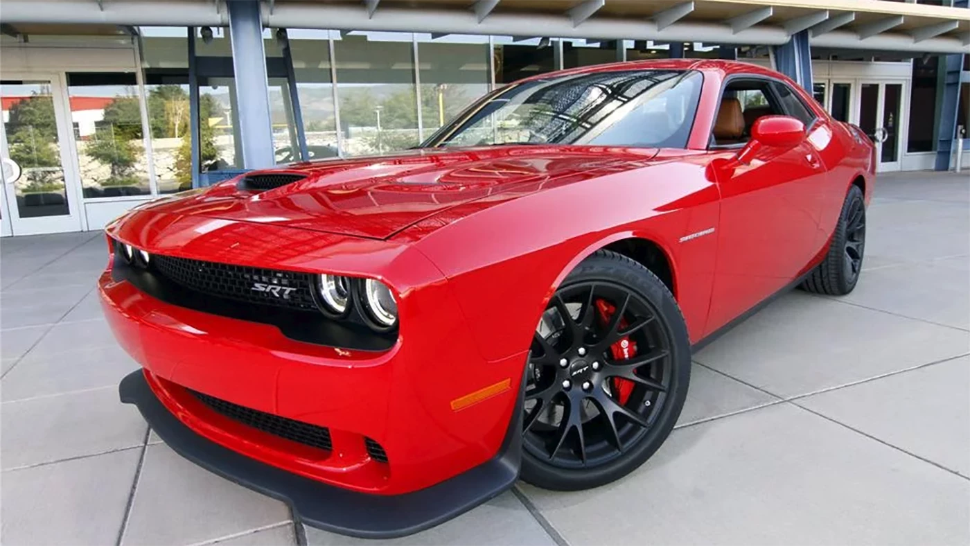 Las Vegas icons Wayne Newton and Penn Jillette (of Penn & Teller) were on the Barrett-Jackson Las Vegas Auction block to encourage bidding for this 2015 Dodge Challenger SRT Hellcat VIN 001 in September, 2014. The spruiking worked, as bidding went to $825,000.