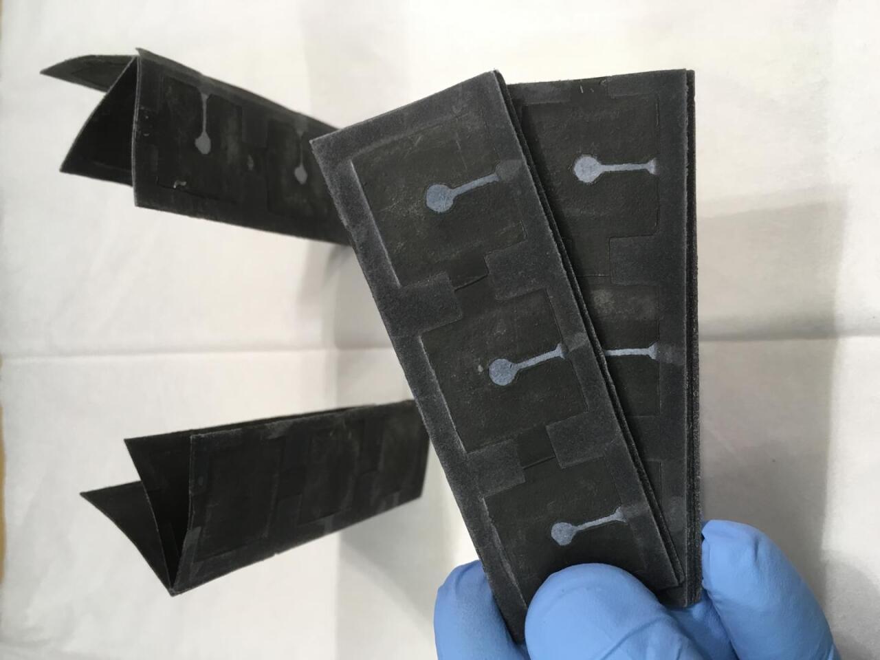 The researchers folded and stacked the battery into different configurations, which produced varying amounts of power