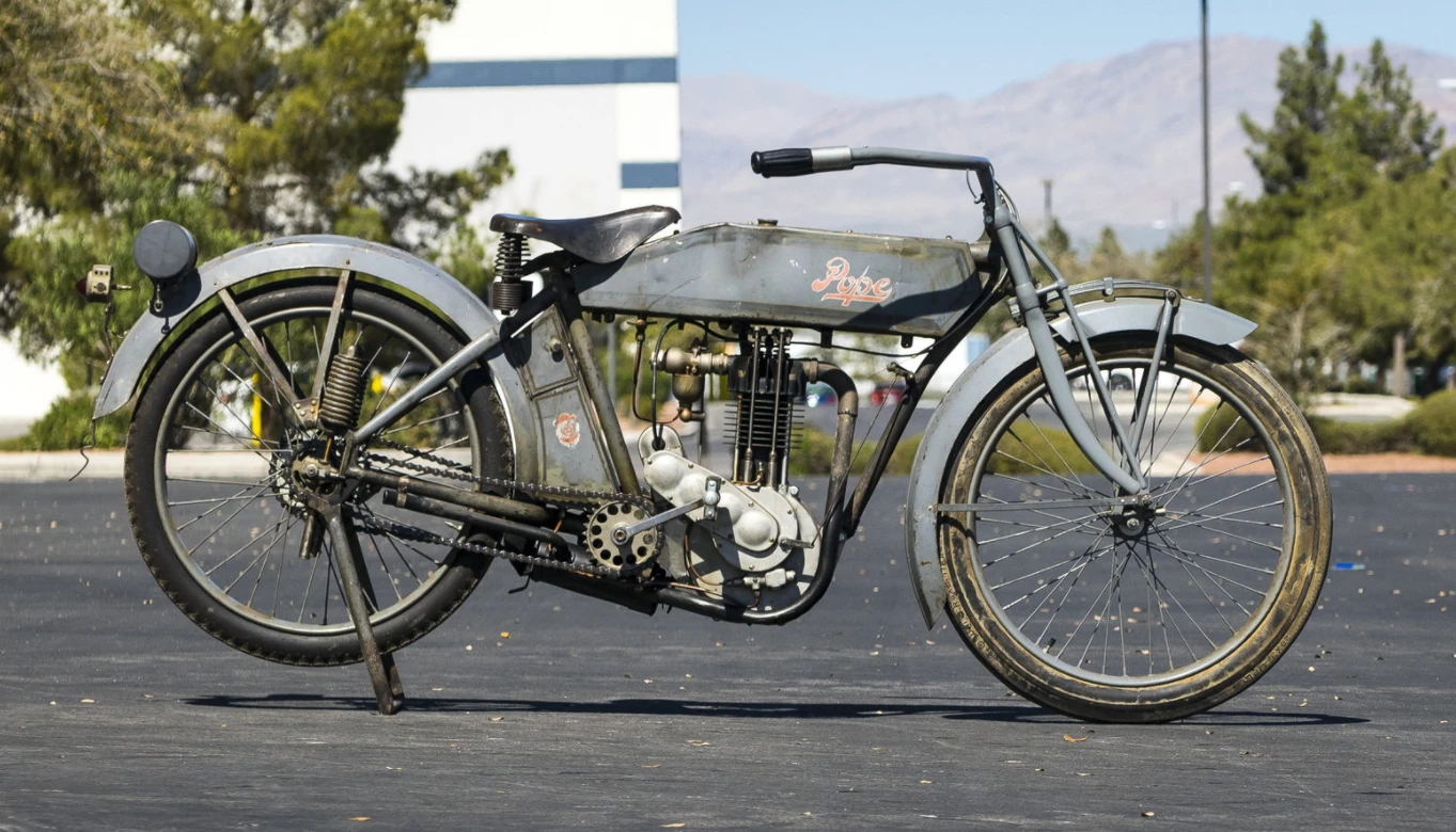 The Model M was the first Pope single and the first American motorcycle to employ overhead valves in the engine. A significant motorcycle historically and one with the original century-old paint. Auction Description