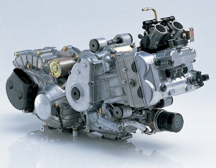The high-tech 638cc parallel twin is canted forward to fit within the scooter's form factor.