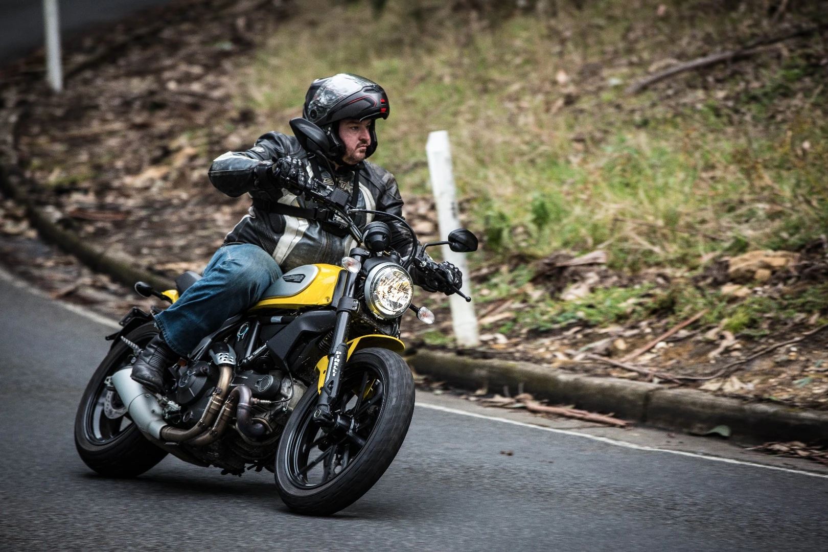 Loz looking serious aboard the 2015 Ducati Scrambler