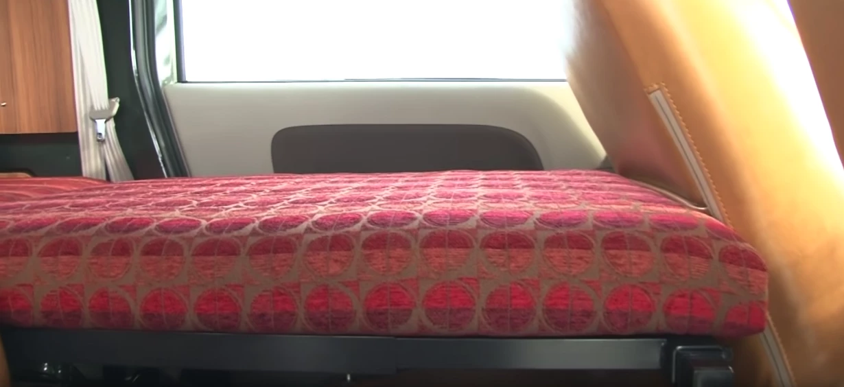 The bed frame folds over the folded rear seats