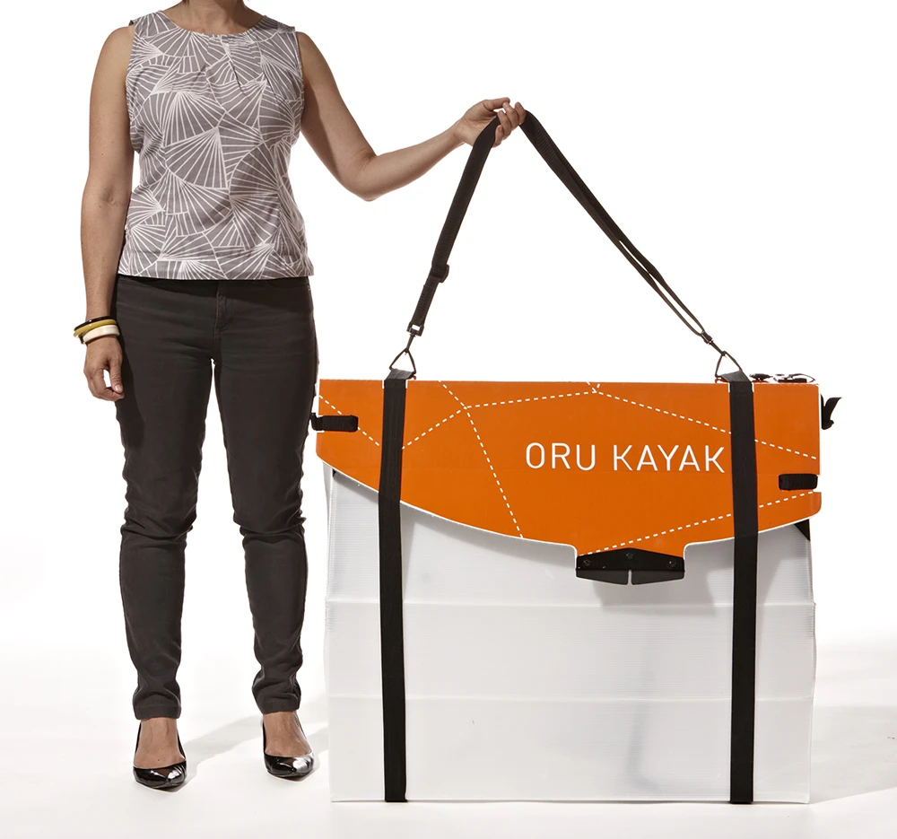 Thanks to a series of folds, the Oru kayak breaks down into a shoulder bag