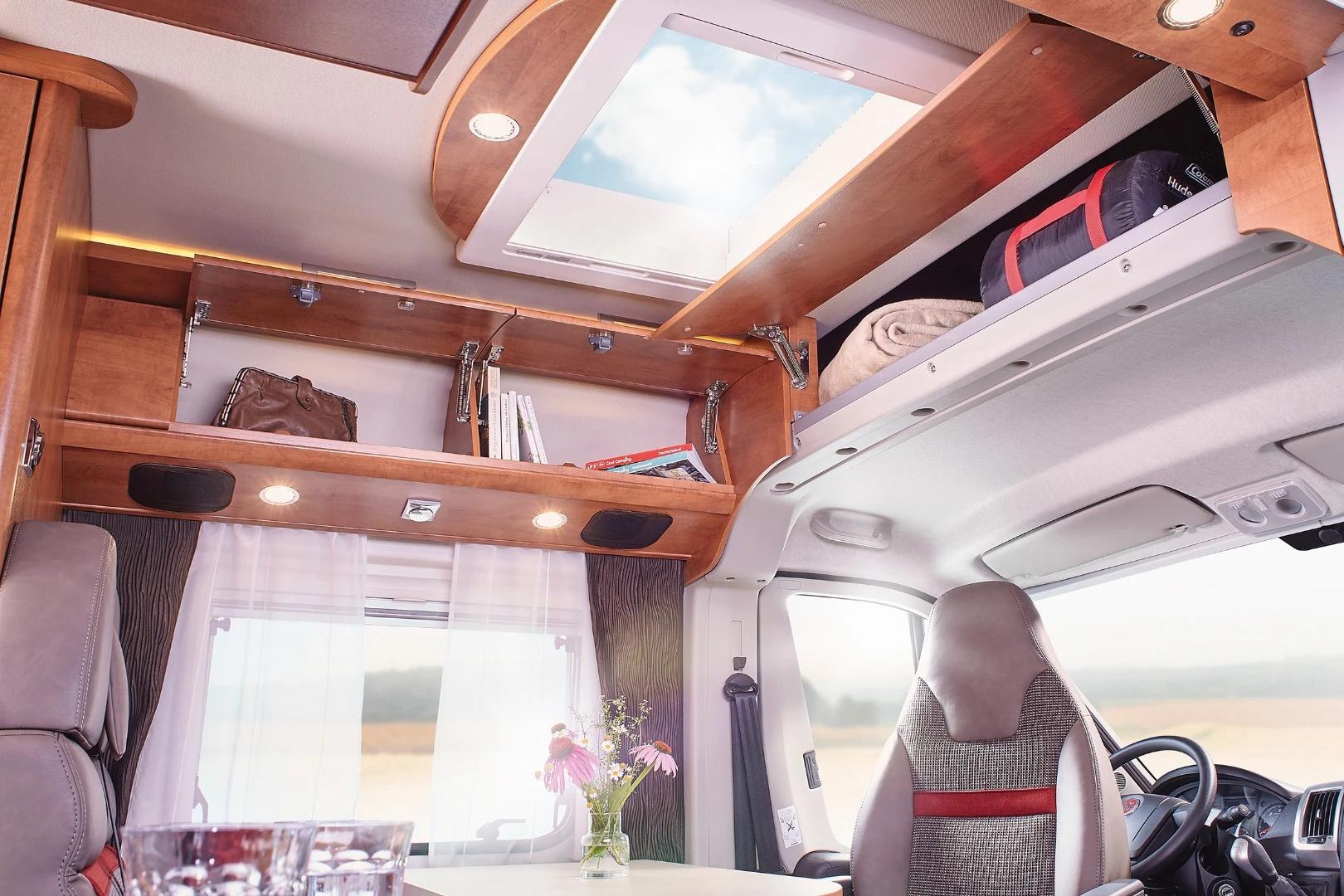Another look at the separation between camper roof/skylight and automotive roof on an older Malibu model