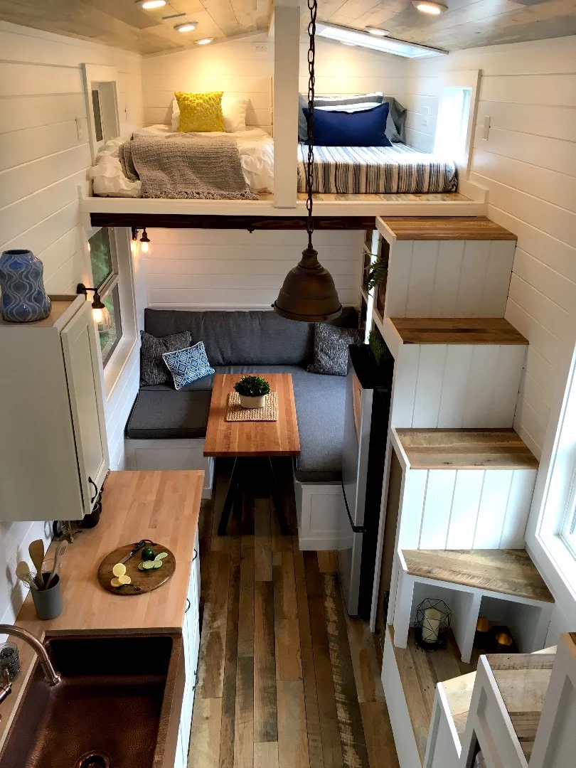 The Rocky Mountain Tiny Home is based on a triple-axle 28 ft (8.5 m)-long trailer