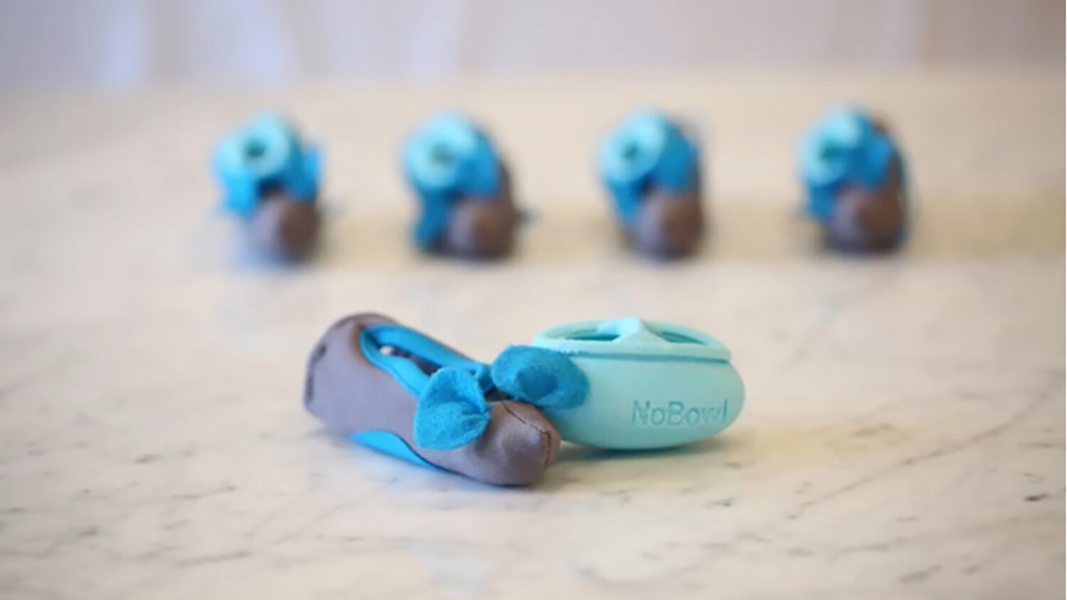 Bowl-free feeding system brings out the hunter in your cat
