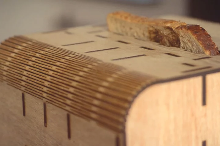 The image-embossed bread popping out of the Super Mega Mega Toaster