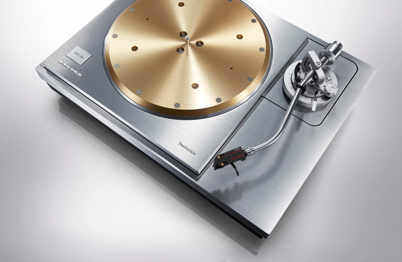 The Technics SP-1000R is sold as a complete turntable system, with base cabinet and tonearm (though no cartridge)