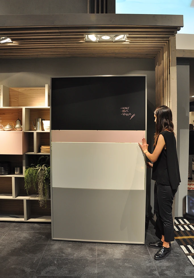 The Kitchen Box features a large bi-folding door which turns on wheels and opens up to create a compact kitchen