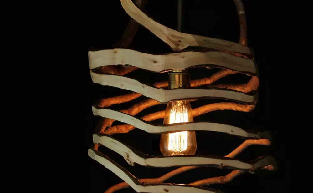 A timber spiral lampshade is a unique object
