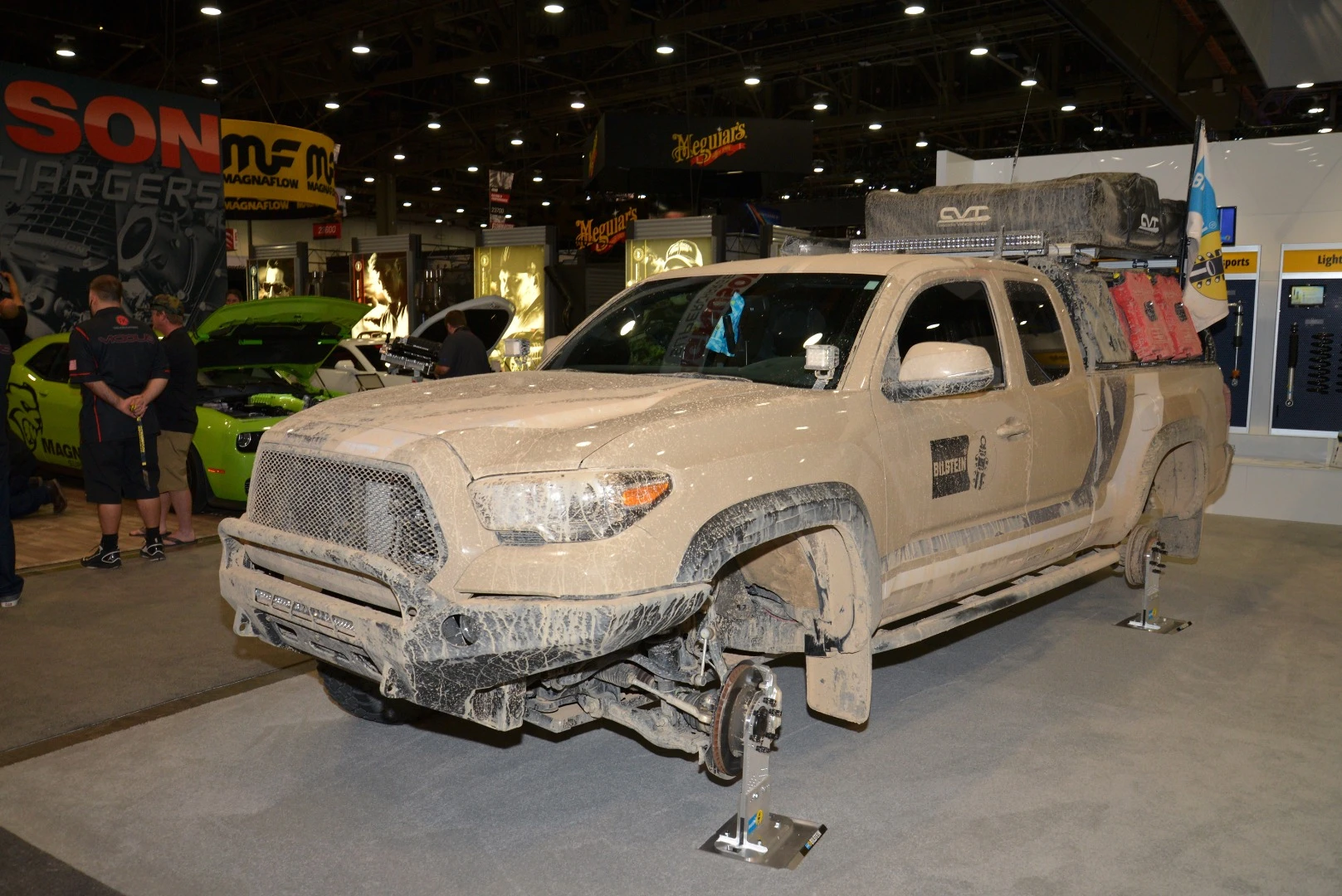 One dirty pickup truck that looks ready for an overland expedition ... save for the lack of wheels