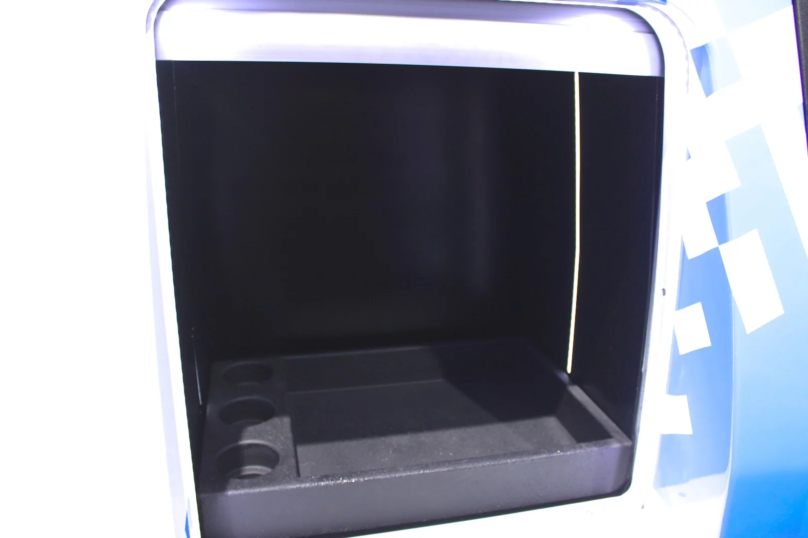 The Ford/Postmates research vehicle has a variety of compartments for storing deliveries