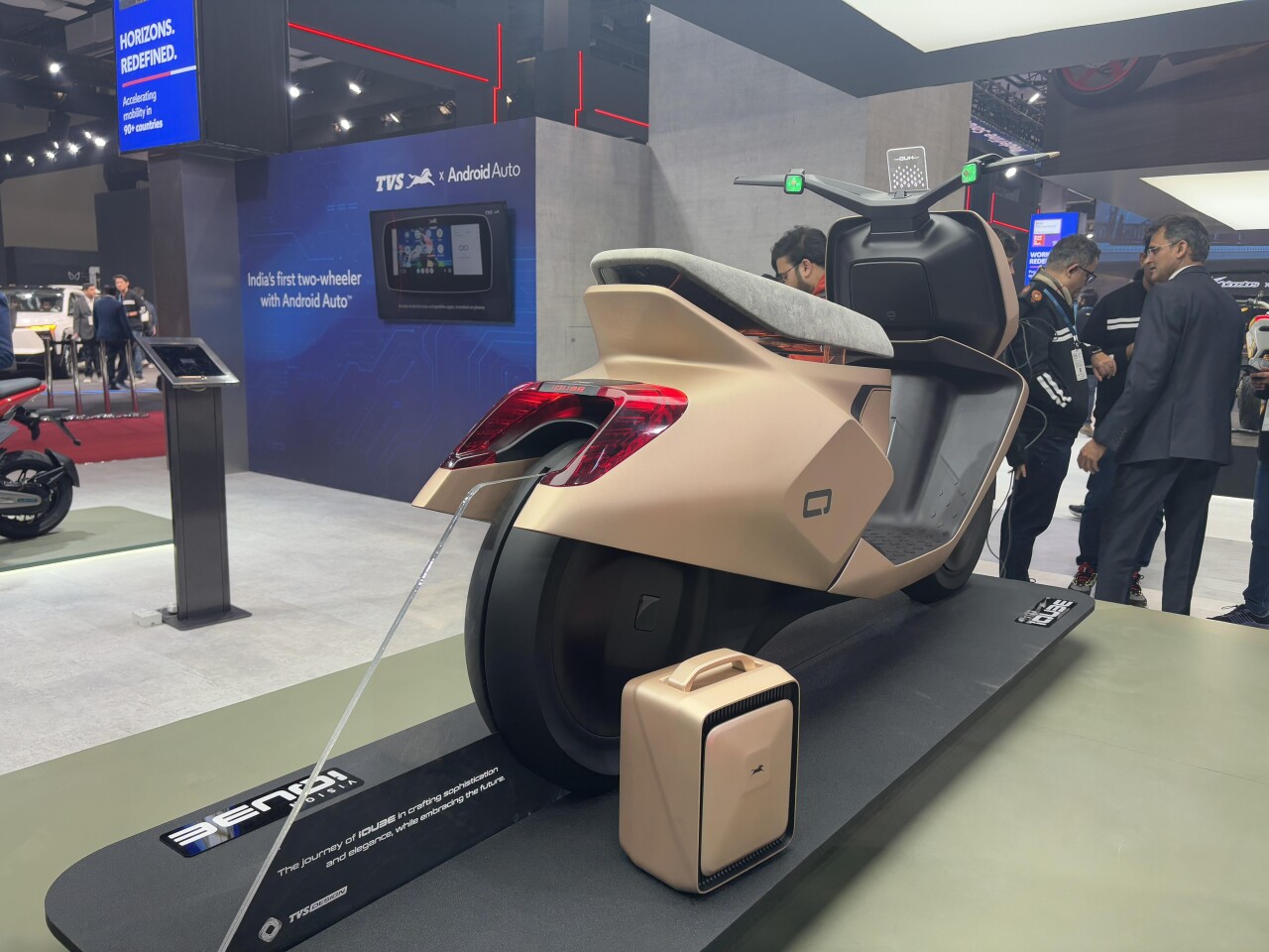 The TVS Vision iQube concept's small seat and contoured body panels add to its appeal