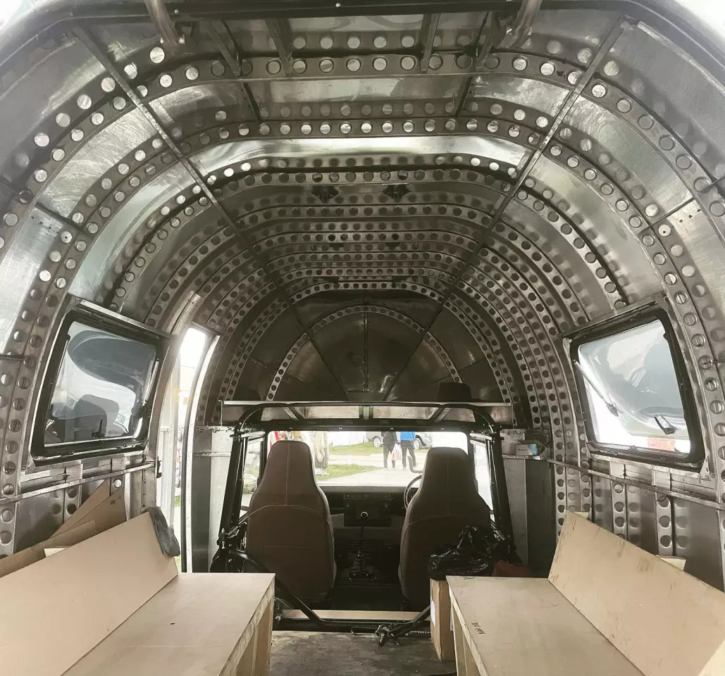 We look forward to seeing the finished Duckworth Overland Aerover interior, but there's something rather spectacular about the bare aluminum walls and Erector-like frame members