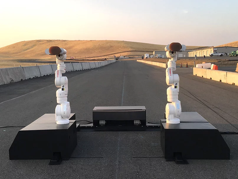 Yamaha Motobot: this rig grabs the bike and holds it upright when it's finished riding