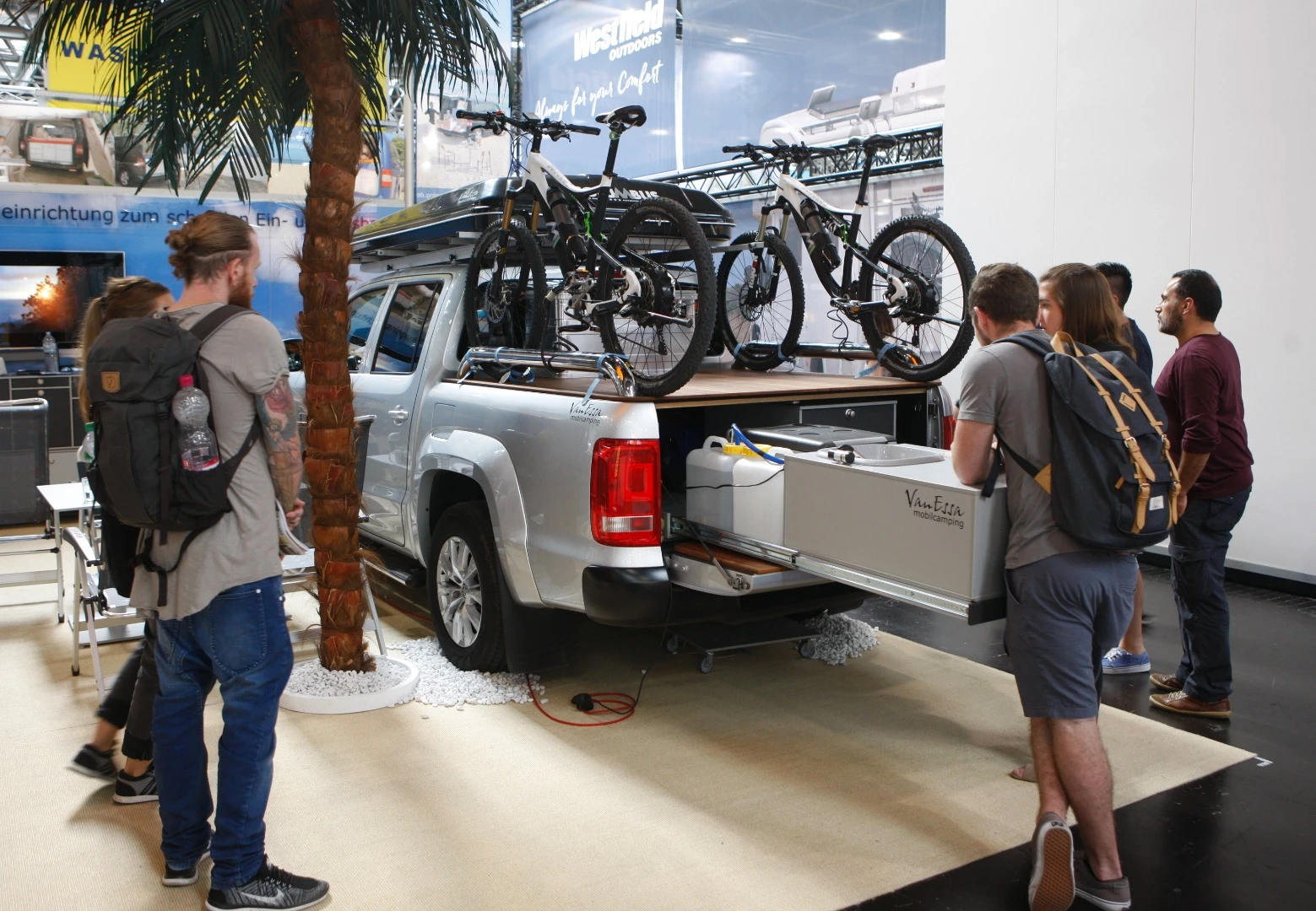 VanEssa shows a sportier "adventure weekend" type of set-up at the 2017 Düsseldorf Caravan Salon, with roof-top tent, slide-out kitchen and bikes all ready to go