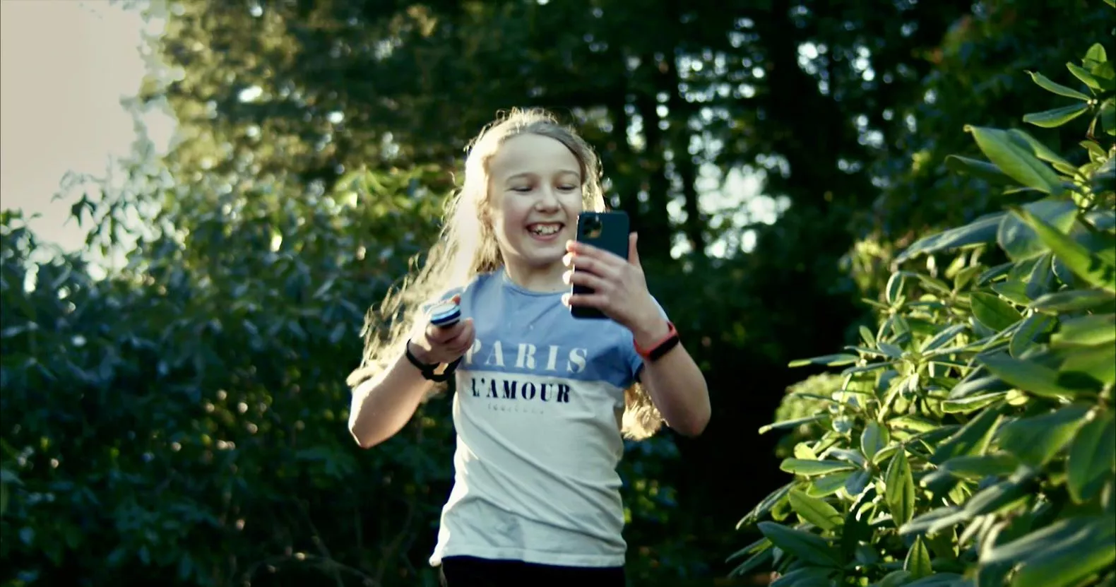 The Udu Console is a hand-held, Wii-style motion controller that connects to smartphones to play Pokemon 3D-style video games in the real world