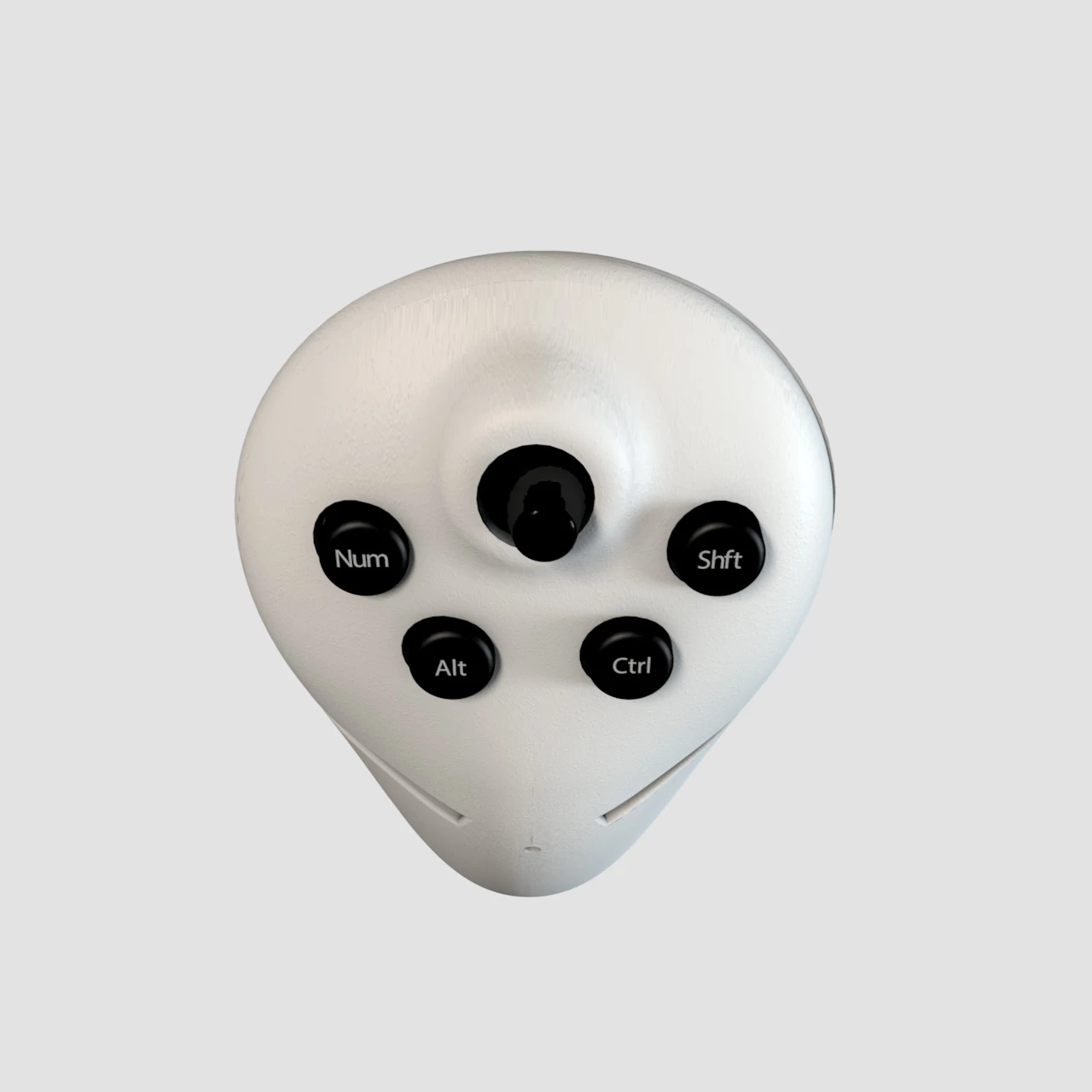 The top side of the Twiddler3 is manipulated using the thumb and includes special keys like shift and control