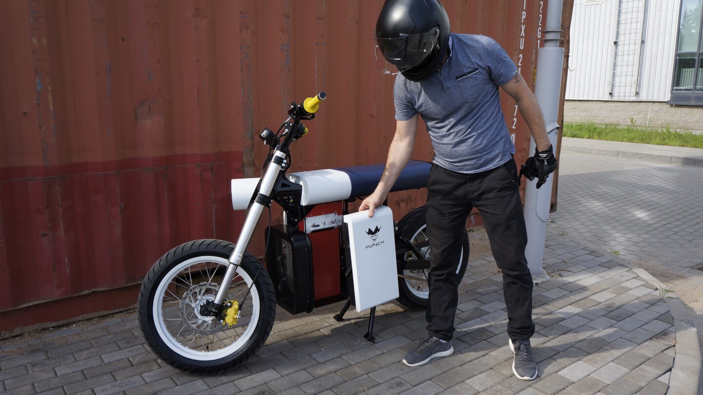 The batteries clip on and off with a quick-release mechanism