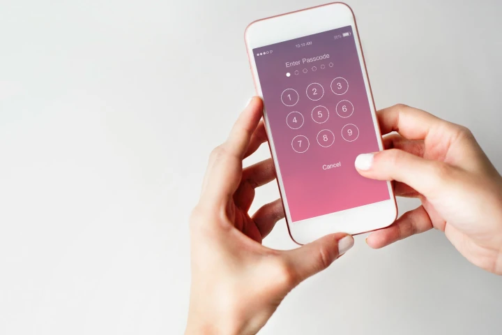 A traditional smartphone keypad, which shows the same configuration of numbers to all observers