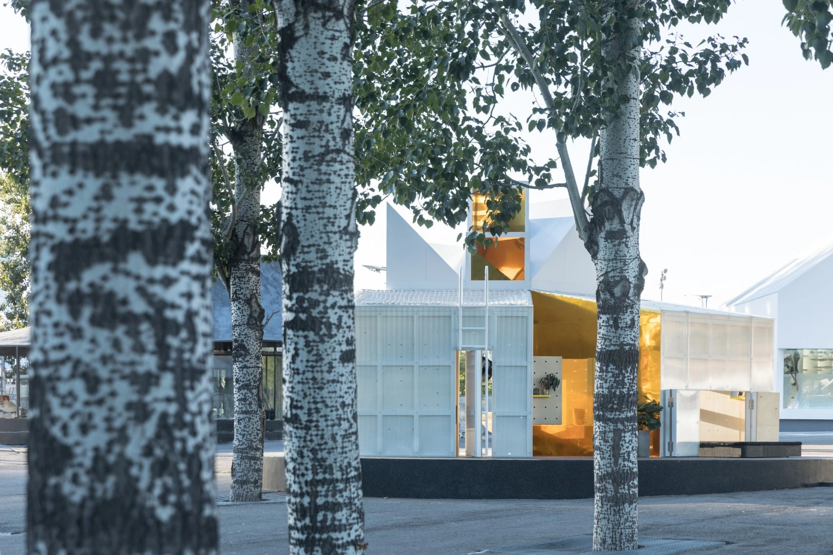 A look inside the Mini Living Urban Cabin Beijing features some of the same design elements seen on Mini’s Urban Cabin concept for LA, with rotating wall panels that swing up or around to create shelves and open interiors up to the outside