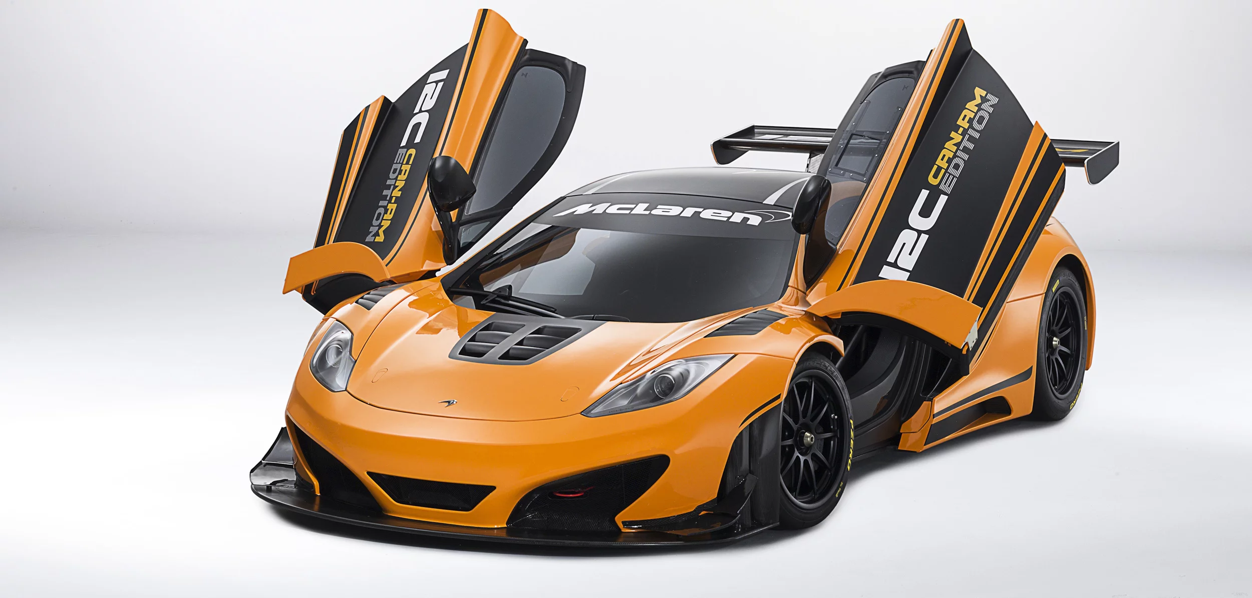 McLaren 12C Can-Am Edition racing concept front angle view door open
