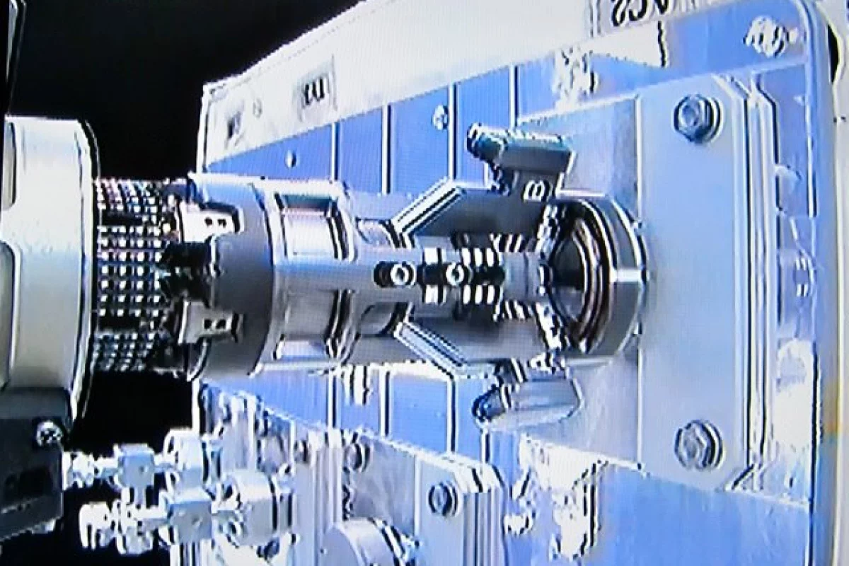 The Multifunction Tool uses its attached adapter to manipulate a plug located under the Ambient Cap on the RRM module (Image: NASA/CSA)