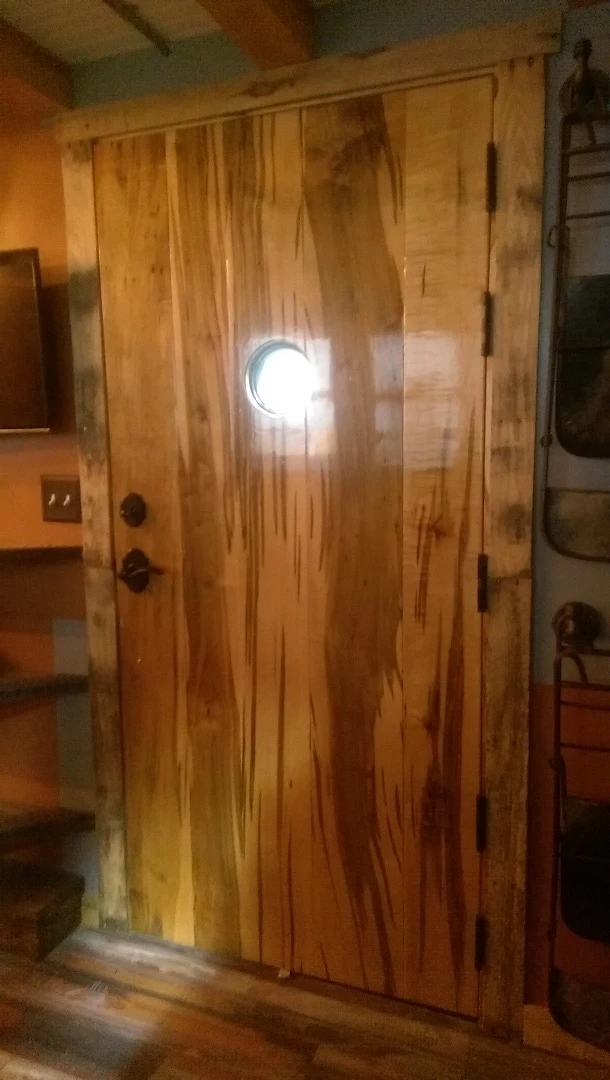 Greg Dewey, my brother-in-law created from scratch the custom front door and jam (which weighed roughly 250 pounds [or 113 kg] once completed)," explains MacInnes (Photo: Maximus Extreme Living Solutions)