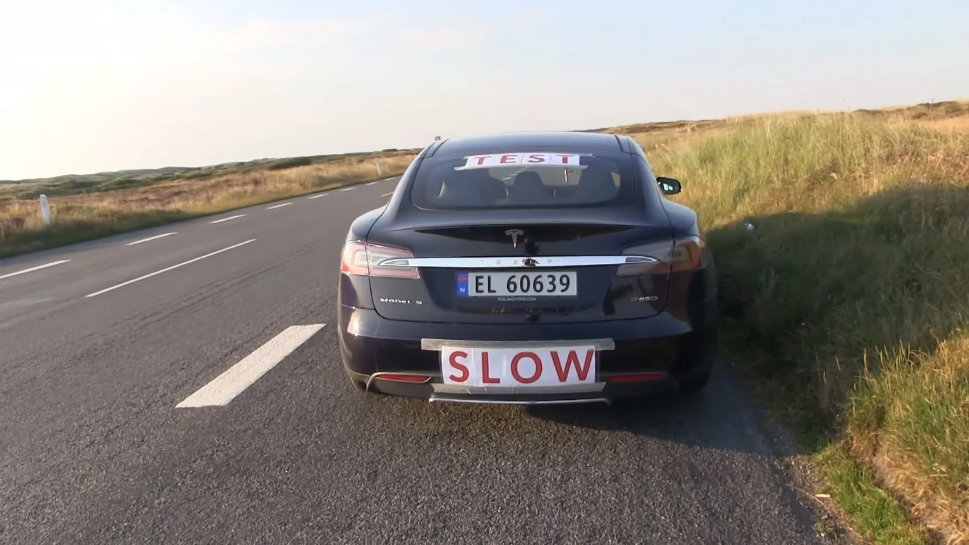 A sign was used to notify other road-users of the vehicle's low speed