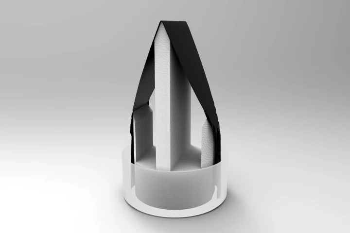 The new water purification technique involves draping a sheet of carbon-dipped paper in an upside-down “V"