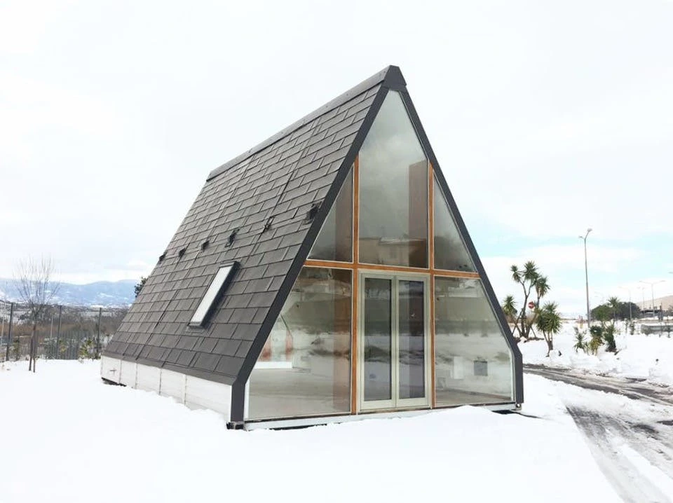 The prefabricated foldable M.A.Di house by Italian architect Renato Vidal takes less than a day to install