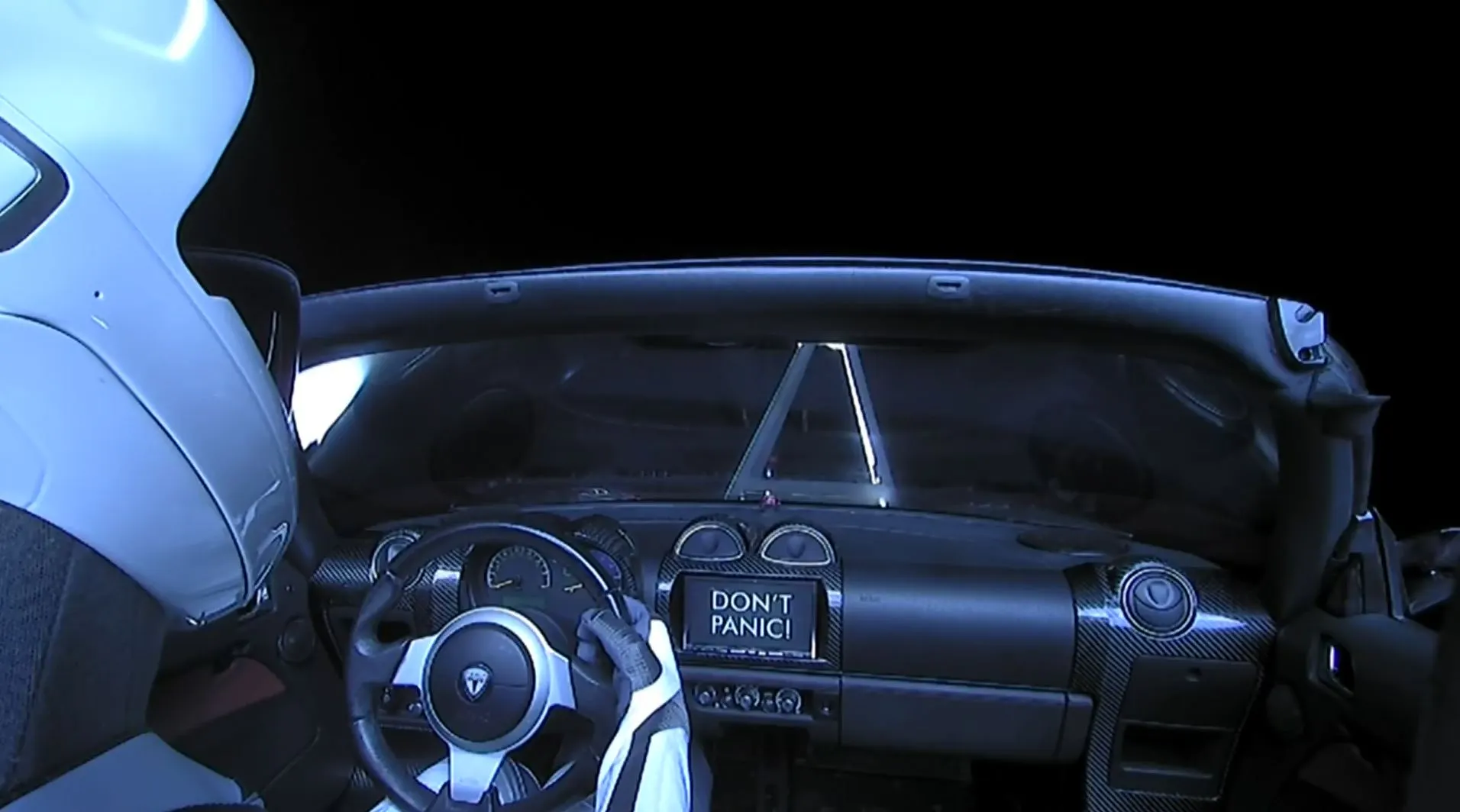 Backseat view of the Roadster in space