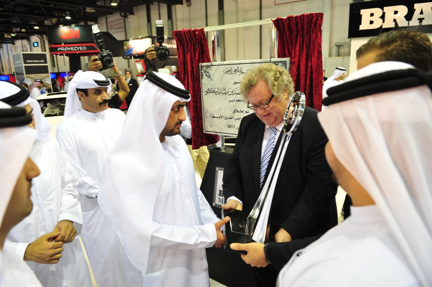 His Highness Sheikh Maktoum bin Mohammed bin Rashid Al Maktoum at the Brabus stand during the 2011 Dubai International Motor Show