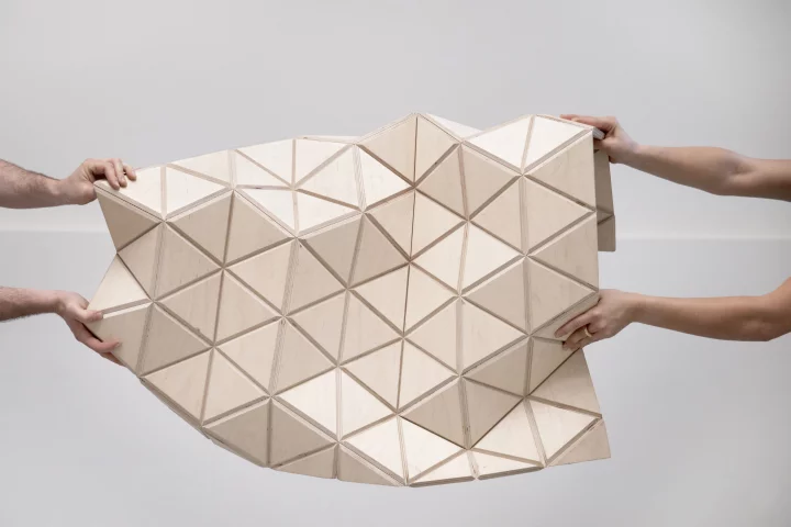 The current WoodSkin product is a sandwich of plywood triangular tiles with a textile mesh in-between (Image: MammaFotogramma)