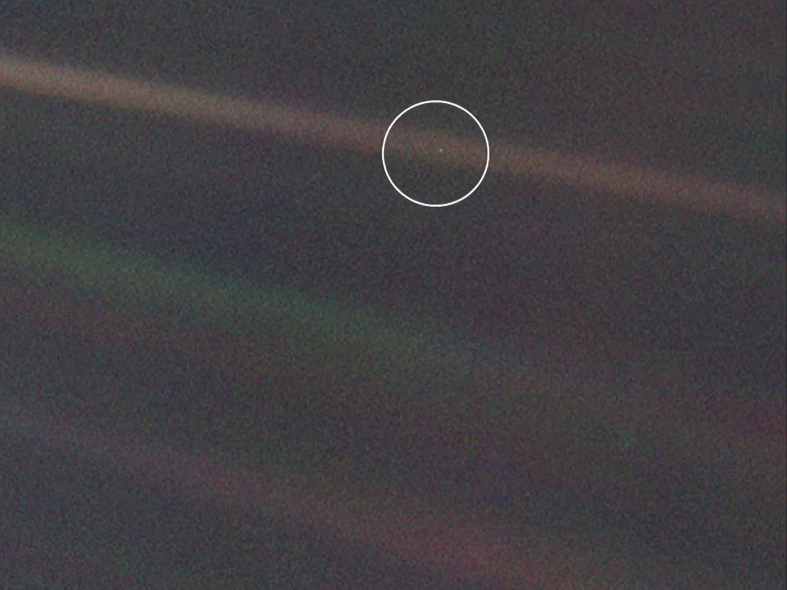 Earth (circled) as seen from Voyager 1 (Image: NASA)