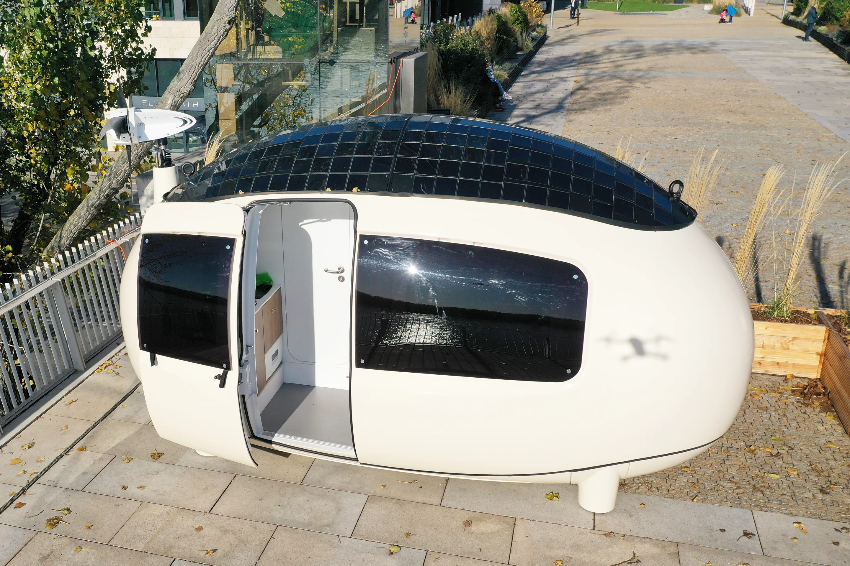The original Ecocapsule, shown, comes with a wind turbine, though the Space only has a solar panel array
