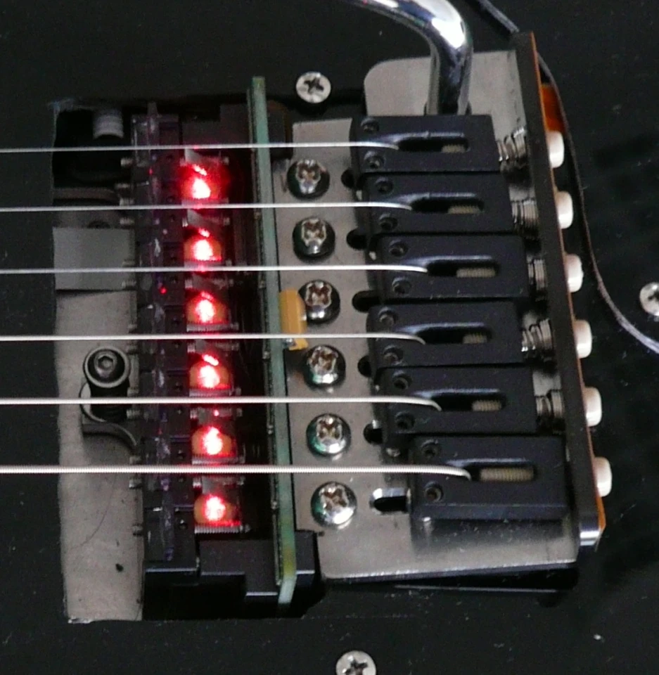 The LPD Pickup system also includes pressure-sensitive, piezo-elements built into the tailpiece to register such things as string bends