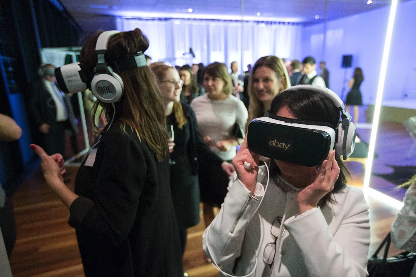 Shoppers try out the eBay VR Department Store at the launch event in Sydney, Australia
