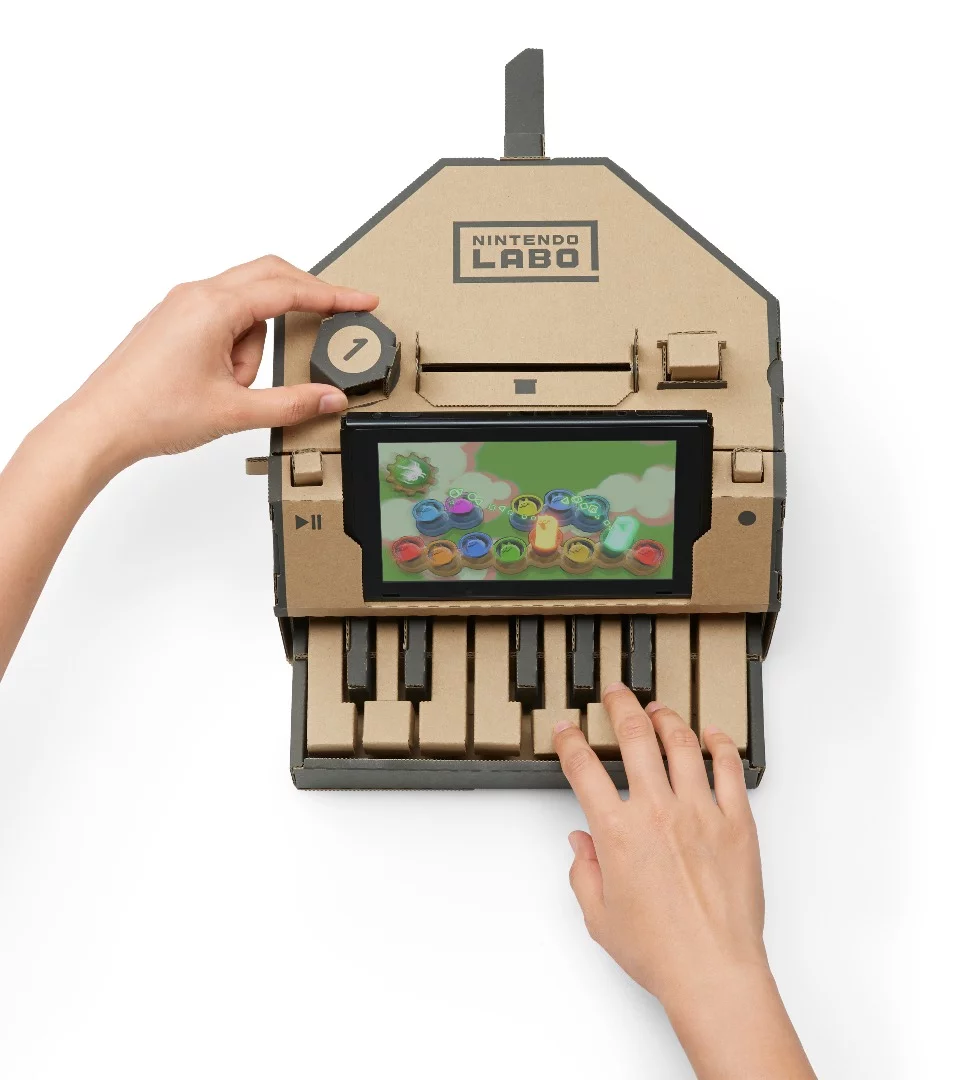 Nintendo Labo Toy-Con Piano uses the Joy-Con's infrared sensor to detect which cardboard key is pressed and play that note on the Switch console