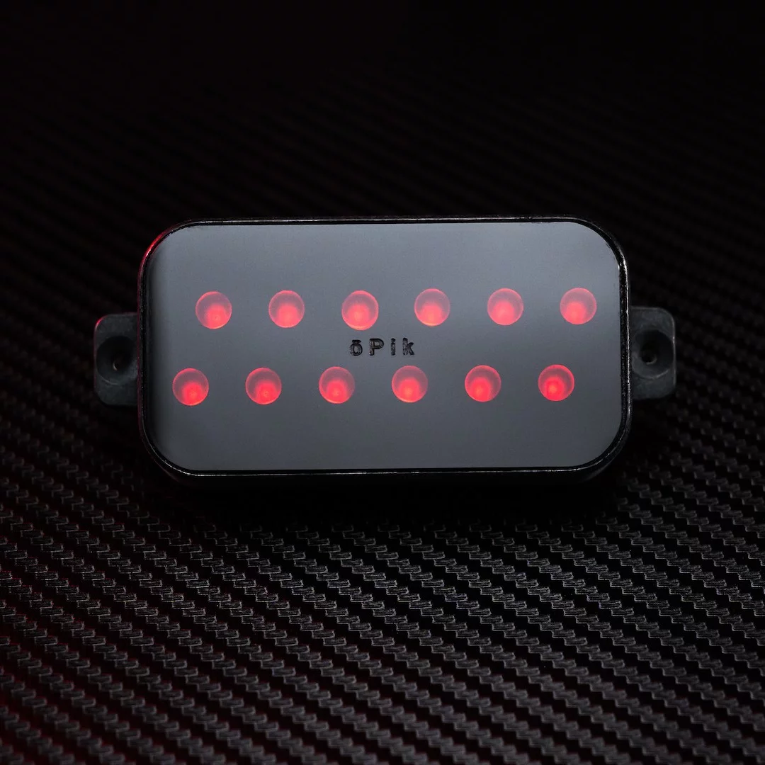 The ōPik is shaped like a traditional humbucker pickup, but uses infrared LEDs to convert string vibrations into a signal for output via a guitar amp