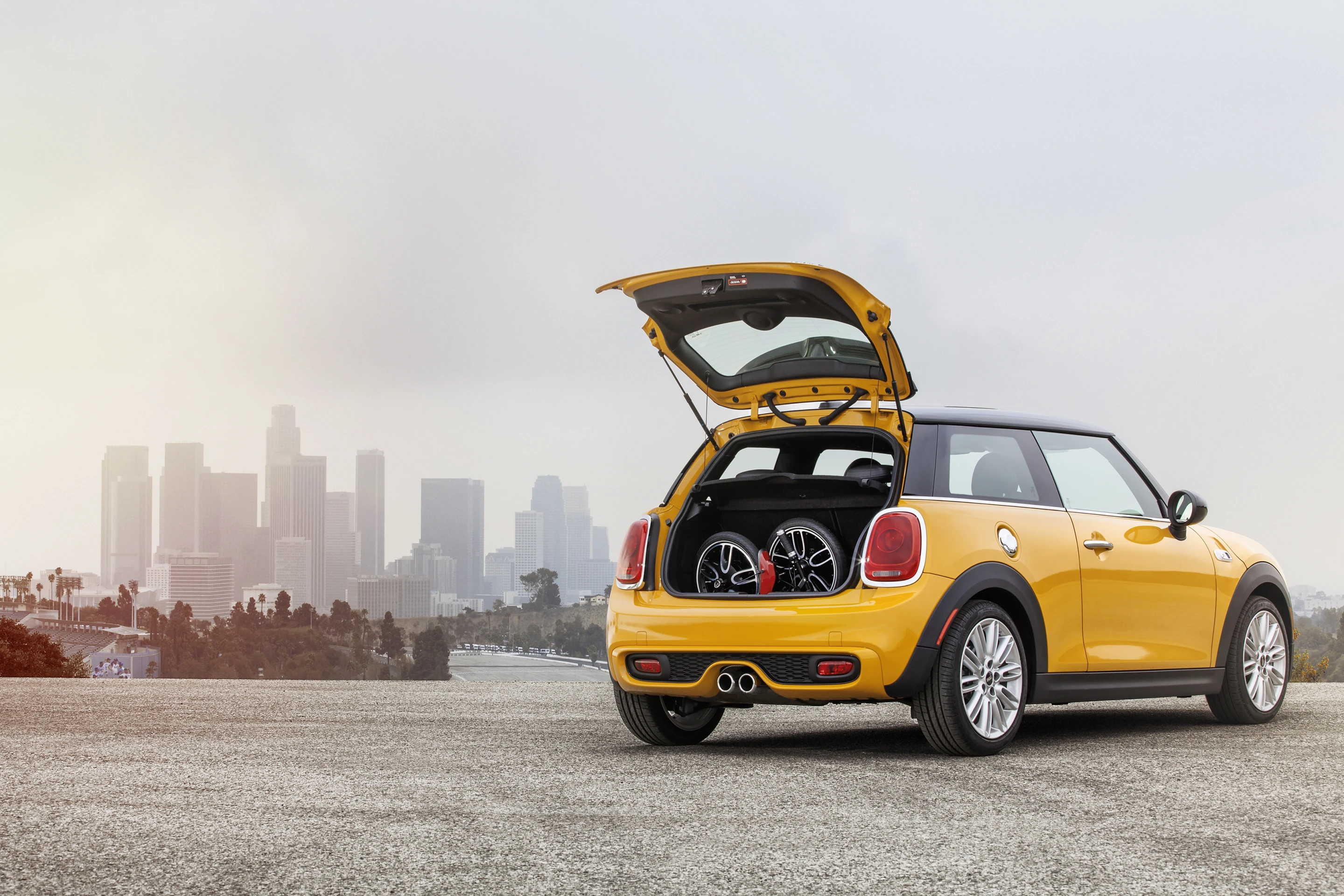 BMW says that the Mini CitySurfer concept would be compact enough when folded up to be carried on buses and trains or thrown in the back of the car