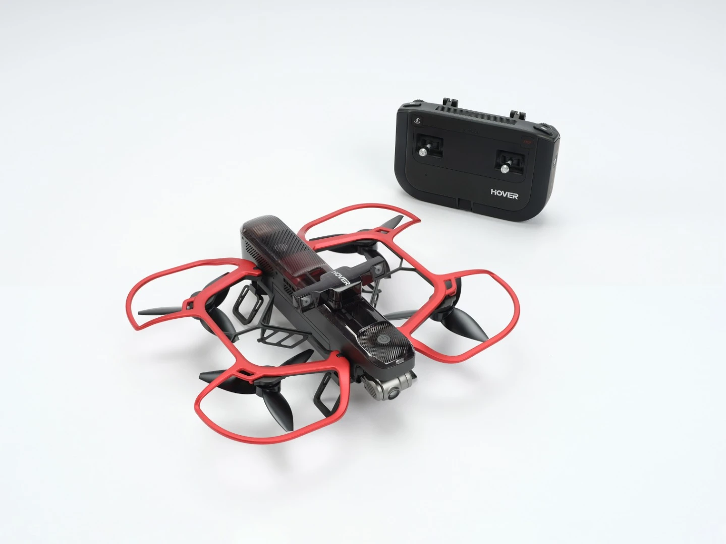 The Hover 2 has a Blast Off Mode that extends range and flight time, using a Blast Off Remote (back) and more aerodynamic prop guards