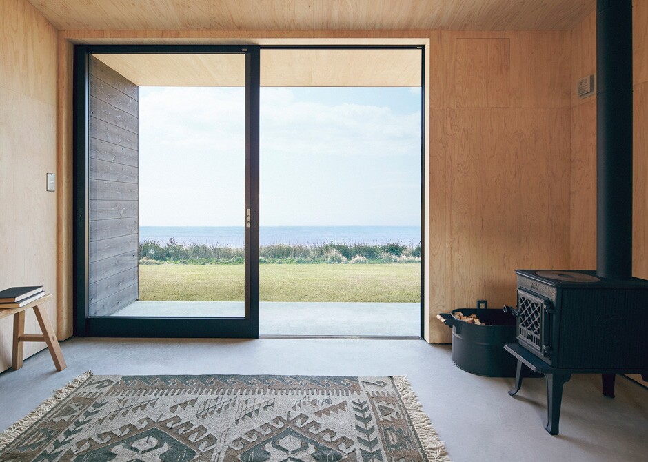 Access to the Muji Hut is gained by a large sliding glass door