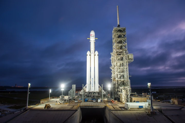 The Falcon Heavy sits on the pad ahead of launch
