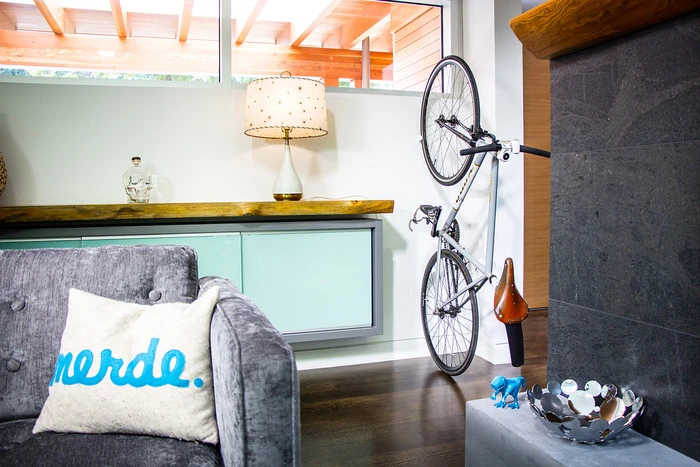 It offers a lower-profile, more interior designer-friendly alternative to hooks