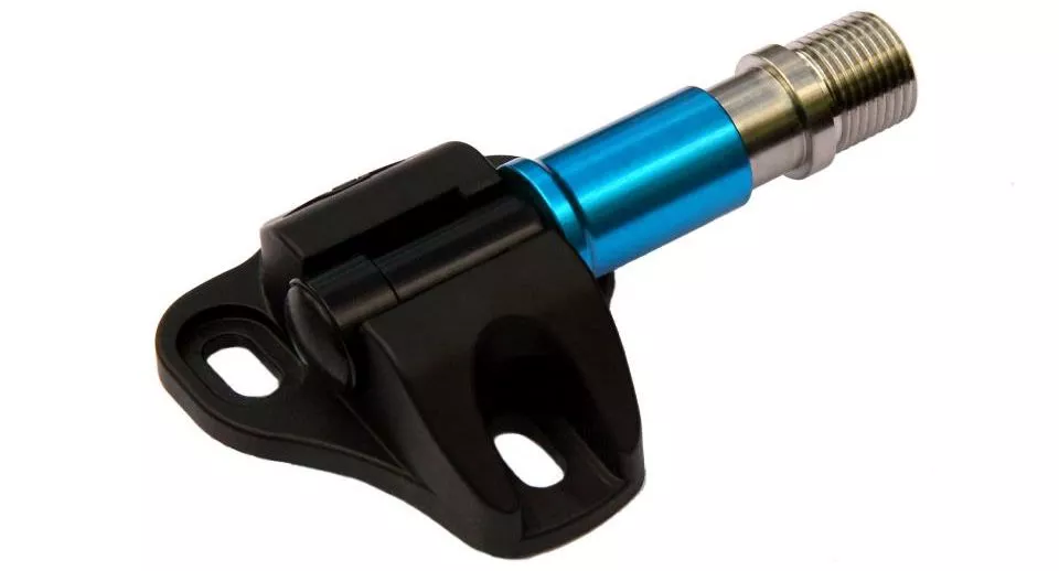 The Ultralite cleat, engaged with the pedal (displayed upside down)